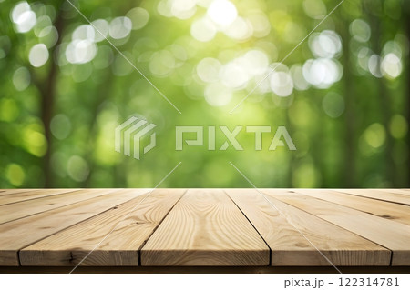 Photorealistic image of a wooden table top with a blurred background of a bright, sunny forest 122314781