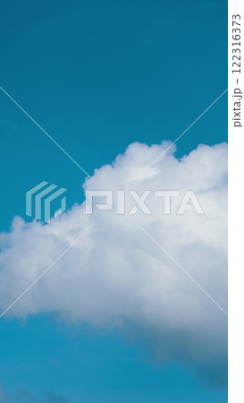 Convection In Atmosphere. Nature Blue Sky Clear Weather Background. White Clouds Background. Vertical Time Lapse. Convection In Atmosphere. Nature Blue Sky Clear Weather Background. White Clouds Background. Vertical Time Lapse. 122316373