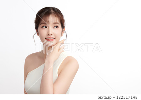 Beautiful young asian woman with clean fresh skin on white background, Face care, Facial treatment, Cosmetology, beauty and spa, Asian women portrait. Beautiful young asian woman with clean fresh skin on white background, Face care, Facial treatment, Cosmetology, beauty and spa, Asian women portrait. 122317148