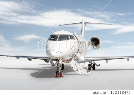 Close-up modern white business jet with an opened gangway door isolated on bright background with sky 122318473