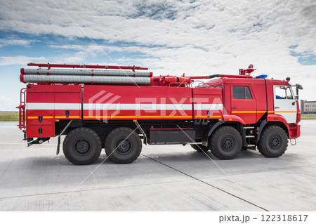 Red airfield firetruck at the airport 122318617