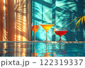 Still life of three bright yellow and red drinks in different glasses against the backdrop of a blue pool and golden sand in a neon style. 122319337
