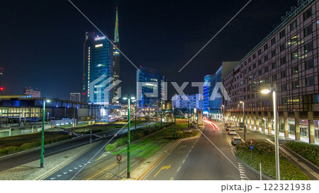 Milan skyline with modern skyscrapers in Porta Nuova business district night timelapse hyperlapse in Milan, Italy 122321938