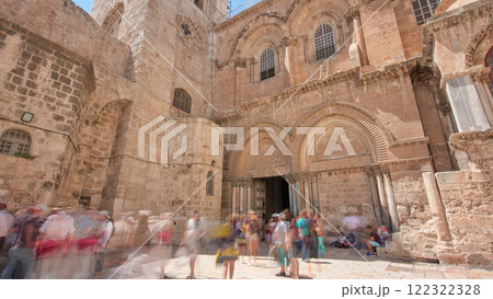 People enter to the Church of the Holy Sepulcher timelapse hyperlapse. 122322328