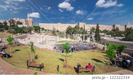 New urban Teddy Park and Tower of David on background under blue sky timelapse hyperlapse in Jerusalem, Israel. New urban Teddy Park and Tower of David on background under blue sky timelapse hyperlapse in Jerusalem, Israel. 122322334