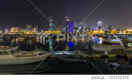 Yachts and boats at the Sharq Marina night timelapse hyperlapse in Kuwait. Kuwait City, Middle East 122322378