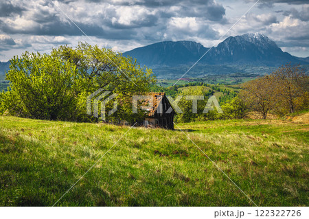 Lonely old rural hut on the glade, Holbav, Romania 122322726