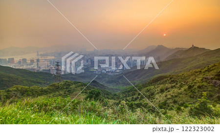 Cityscape of Hong Kong as viewed atop Kowloon Peak with sunset timelapse with Hong kong and Kowloon below 122323002