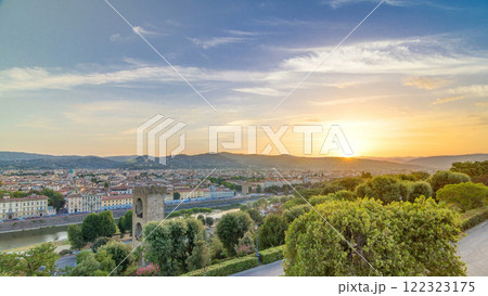 Sunrise top view of Florence city timelapse with arno river bridges and historical buildings Sunrise top view of Florence city timelapse with arno river bridges and historical buildings 122323175