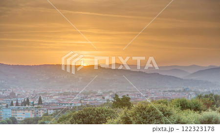 Sunrise top view of Florence city timelapse with arno river bridges and historical buildings 122323178