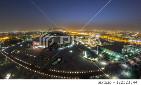 Aerial view of Aspire Zone stadium from top night to day timelapse in Doha Aerial view of Aspire Zone stadium from top night to day timelapse in Doha 122323344
