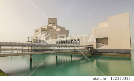 Qatar's museum of Islamic Art timelapse hyperlapse on its man-made island beside 122323355