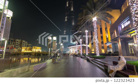 Walking area near the Dubai Fountain at night, UAE timelapse hyperlapse 122323423