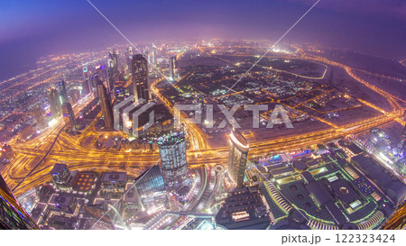 Dubai downtown day to night transition with city lights from above timelapse Dubai downtown day to night transition with city lights from above timelapse 122323424