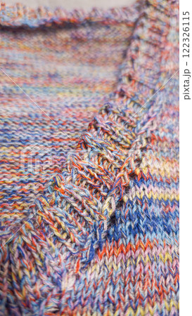 Knitted product from colored threads. Ready-made handmade women's sweater. 122326115