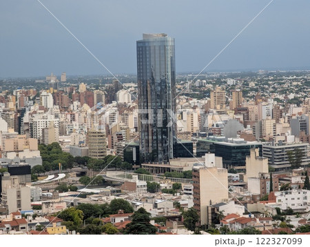 Panoramic view of the city from the tower of the Cardinales Cofico complex. Reflections on a building after rain Panoramic view of the city from the tower of the Cardinales Cofico complex. Reflections on a building after rain 122327099