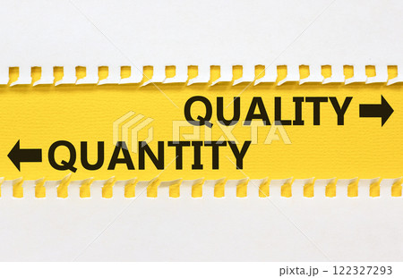 Quantity or quality symbol. Concept word Quantity or Quality on beautiful yellow paper. Beautiful white paper background. Business quantity or quality concept. Copy space. 122327293