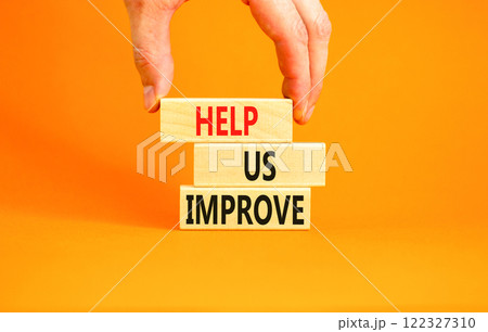 Help us improve symbol. Concept words Help us improve on beautiful wooden blocks. Beautiful orange background. Businessman hand. Business motivational help us improve concept. Copy space. 122327310