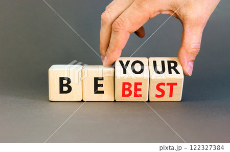 Motivational be your best symbol. Concept words Be your best on beautiful wooden block. Beautiful grey background Businessman hand. Business motivational be your best concept. Copy space. 122327384