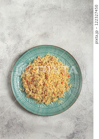 basmati rice with saffron, on a decorative blue plate, light background, homemade, no people, 122327450