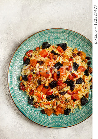 rice dish with dried fruits, nuts and spices of Middle Eastern cuisine, homemade, no people, 122327477