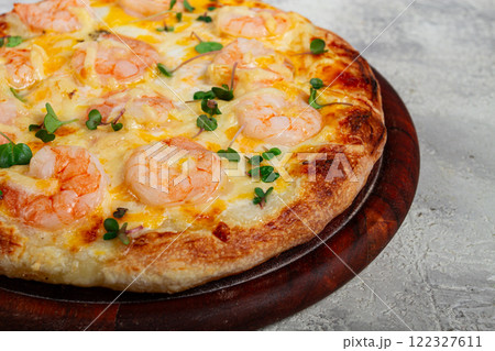four cheese pizza with shrimp and fresh microgreens, served on a wooden board, homemade, no people, four cheese pizza with shrimp and fresh microgreens, served on a wooden board, homemade, no people, 122327611