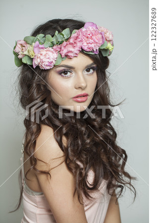 Glamorous fashion brunette model with make-up, fresh clear skin, shiny long wavy hairstyle Glamorous fashion brunette model with make-up, fresh clear skin, shiny long wavy hairstyle 122327689