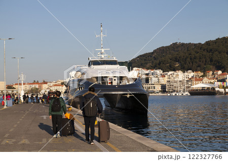 Travelers heading to the morning ferry to Dubrovnik from Split 122327766