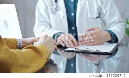 Doctor and patient consultation in clinic. Medicine and health care 122329742