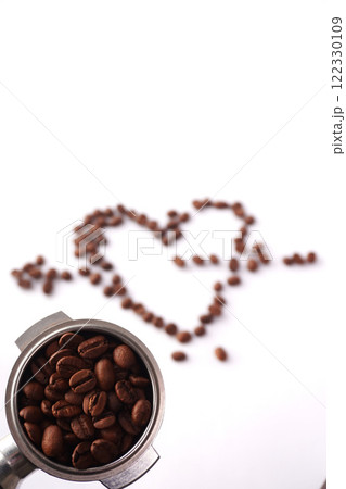 A portfolio filled with roasted coffee beans, on a soft blurred background on a white surface is a heart of coffee beans, symbolizing the passion for coffee. A portfolio filled with roasted coffee beans, on a soft blurred background on a white surface is a heart of coffee beans, symbolizing the passion for coffee. 122330109