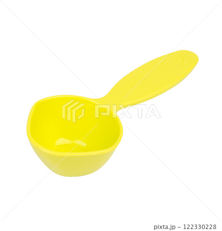 Green measuring spoon isolated on white background 122330228