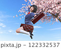 桜の木の前で高くジャンプをする女子高校生 122332537