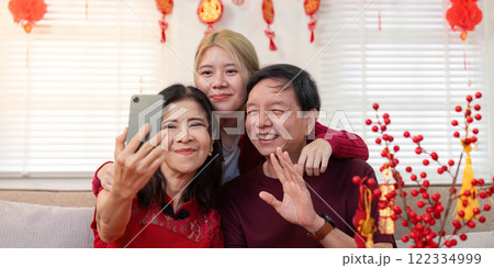 Celebrating chinese new year with family granddaughter captures joyful moments with grandparents at home 122334999