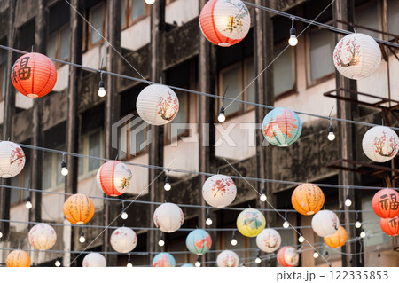 Lunar or Chinese new year lanterns decorated over street, Thailand. The letters mean Luck, Congratulations, Blessing and Happiness Lunar or Chinese new year lanterns decorated over street, Thailand. The letters mean Luck, Congratulations, Blessing and Happiness 122335853