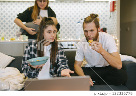 Candid Family Moments Enjoying a Relaxing Time Together in the Comforts of Home Candid Family Moments Enjoying a Relaxing Time Together in the Comforts of Home 122336779