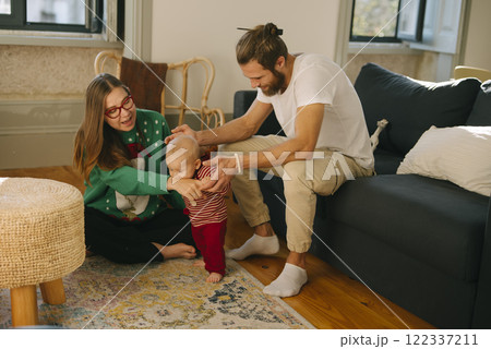 Joyful Family Moments Celebrating Babys Very First Steps, a Special Milestone in Life 122337211