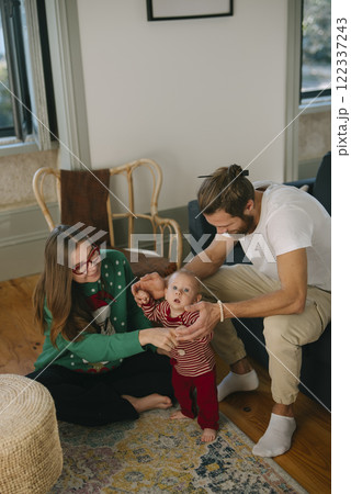 Enjoying Family Bonding Moments in a Cozy and Comfortable Living Room Space Together Enjoying Family Bonding Moments in a Cozy and Comfortable Living Room Space Together 122337243