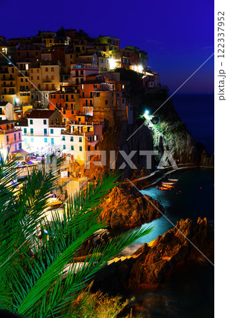 Manarola city La Spezia at dusk on top of the hill, Italy Manarola city La Spezia at dusk on top of the hill, Italy 122337952