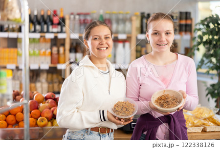 Two friends choosing noodles for lunch 122338126