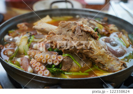 Korean health food made by boiling octopus and ribs together Korean health food made by boiling octopus and ribs together 122338624