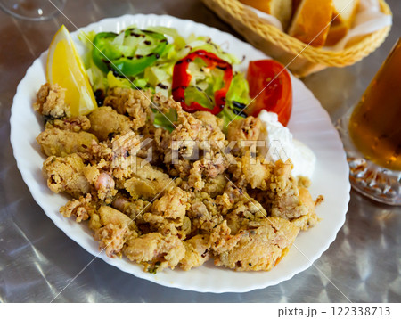 Chipirones battered fried baby squid 122338713