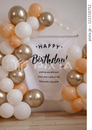 A banner with balloons and the words Happy Birthday written on it A banner with balloons and the words Happy Birthday written on it 122338752