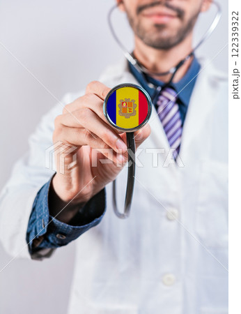 Andorra health and medical insurance concept. Andorra Healthcare System, doctor holding stethoscope Andorra health and medical insurance concept. Andorra Healthcare System, doctor holding stethoscope 122339322