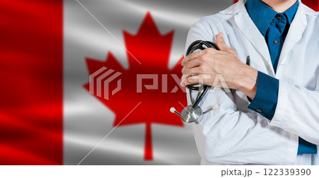 Doctor with stethoscope on Canada flag. Doctor holding stethoscope on Canada flag Doctor with stethoscope on Canada flag. Doctor holding stethoscope on Canada flag 122339390