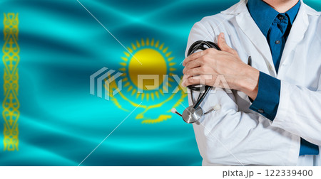 Doctor with stethoscope on Kazakhstan flag. Doctor holding stethoscope on Kazakhstan flag Doctor with stethoscope on Kazakhstan flag. Doctor holding stethoscope on Kazakhstan flag 122339400