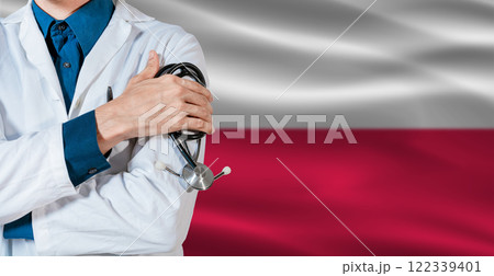Doctor with stethoscope on Poland flag. Doctor holding stethoscope on Poland flag 122339401