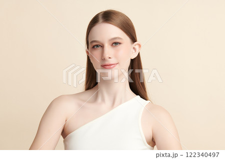 Beautiful young woman with clean fresh skin on beige background, Face care, Facial treatment, Cosmetology, beauty and spa, women portrait. 122340497