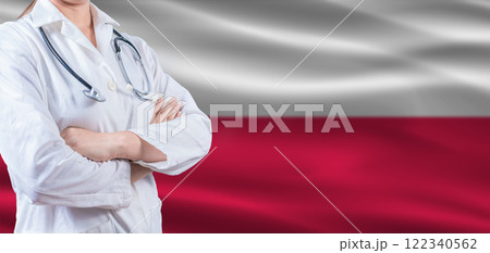 Doctor with crossed arms on Poland flag. Poland Health and Care concept. Female doctor on Poland flag 122340562
