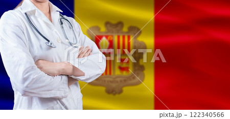 Doctor with crossed arms on Andorra flag. Andorra Health and Care concept. Female doctor on Andorra flag Doctor with crossed arms on Andorra flag. Andorra Health and Care concept. Female doctor on Andorra flag 122340566