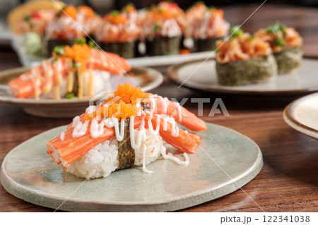 Crab Stick Sushi with Mayonnaise Sauce with Sushi Set Including Nigiri and Maki 122341038